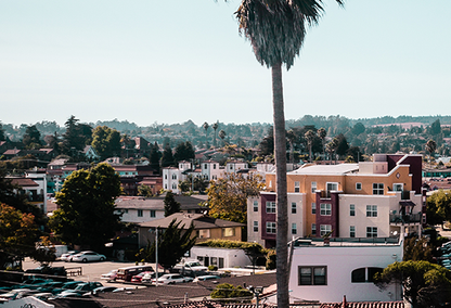 View of homes and mountains in background