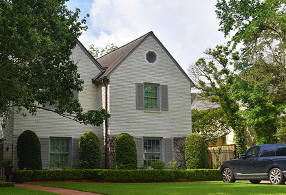 White home with brown shutters