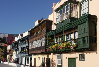 A row of 3 story homes