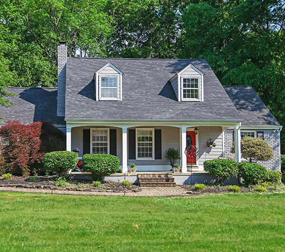 2 story light blue single family home