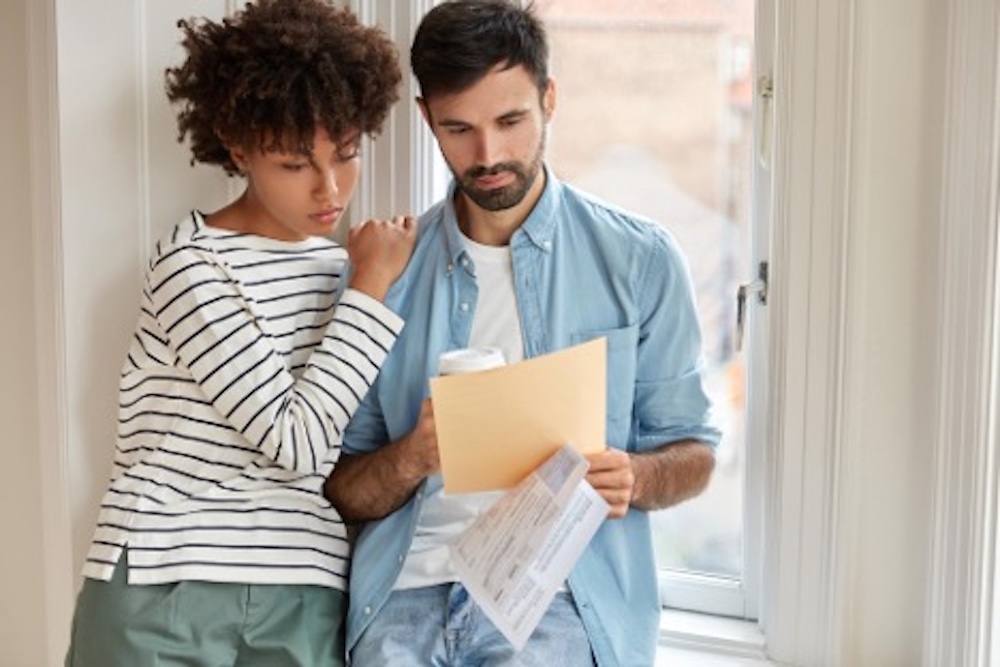 Young Couple looking over paperwork